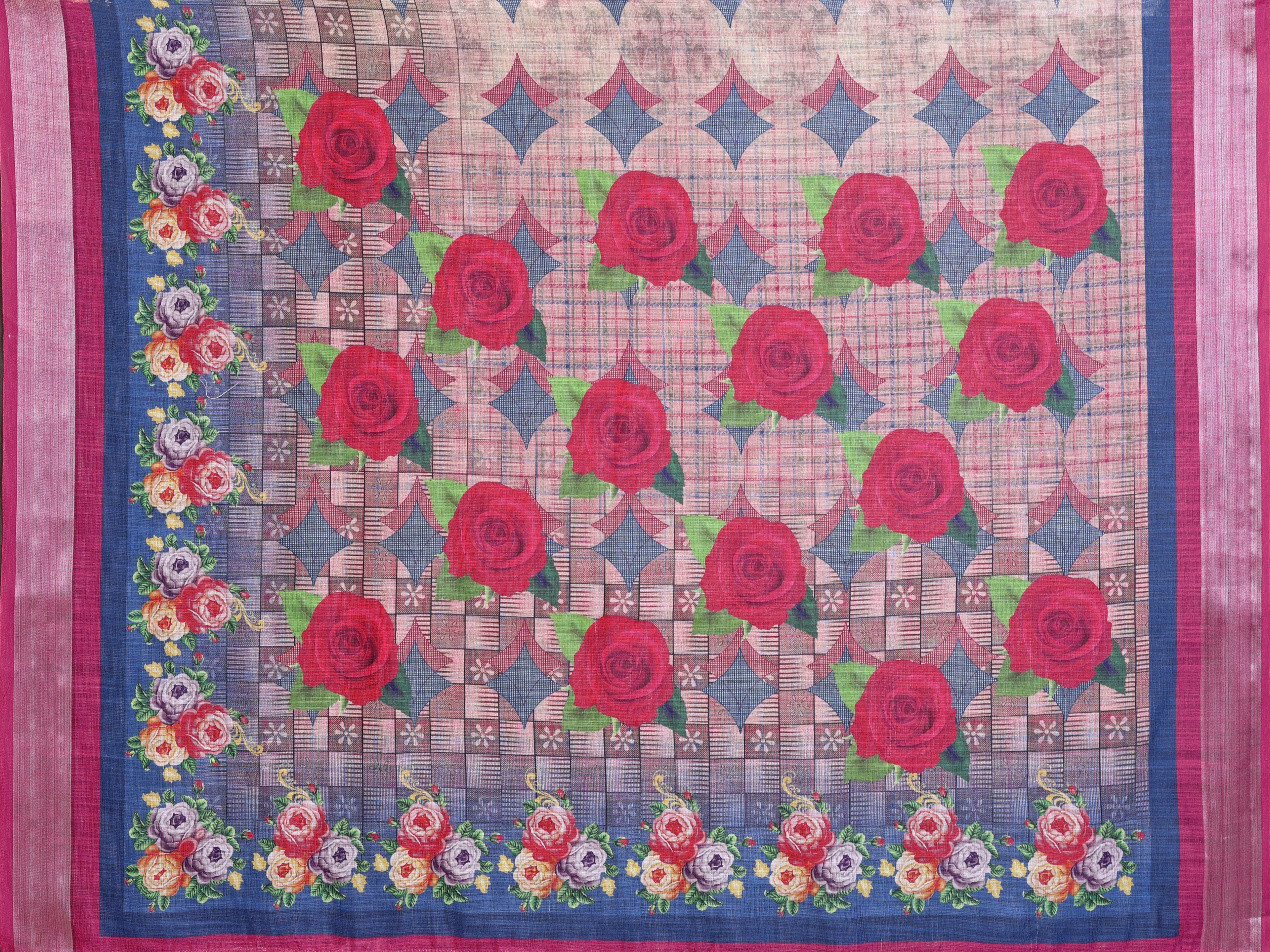NxWear Fashion floral printed saree with embellished border in pink and blue hues, featuring red roses and a checkered pattern.