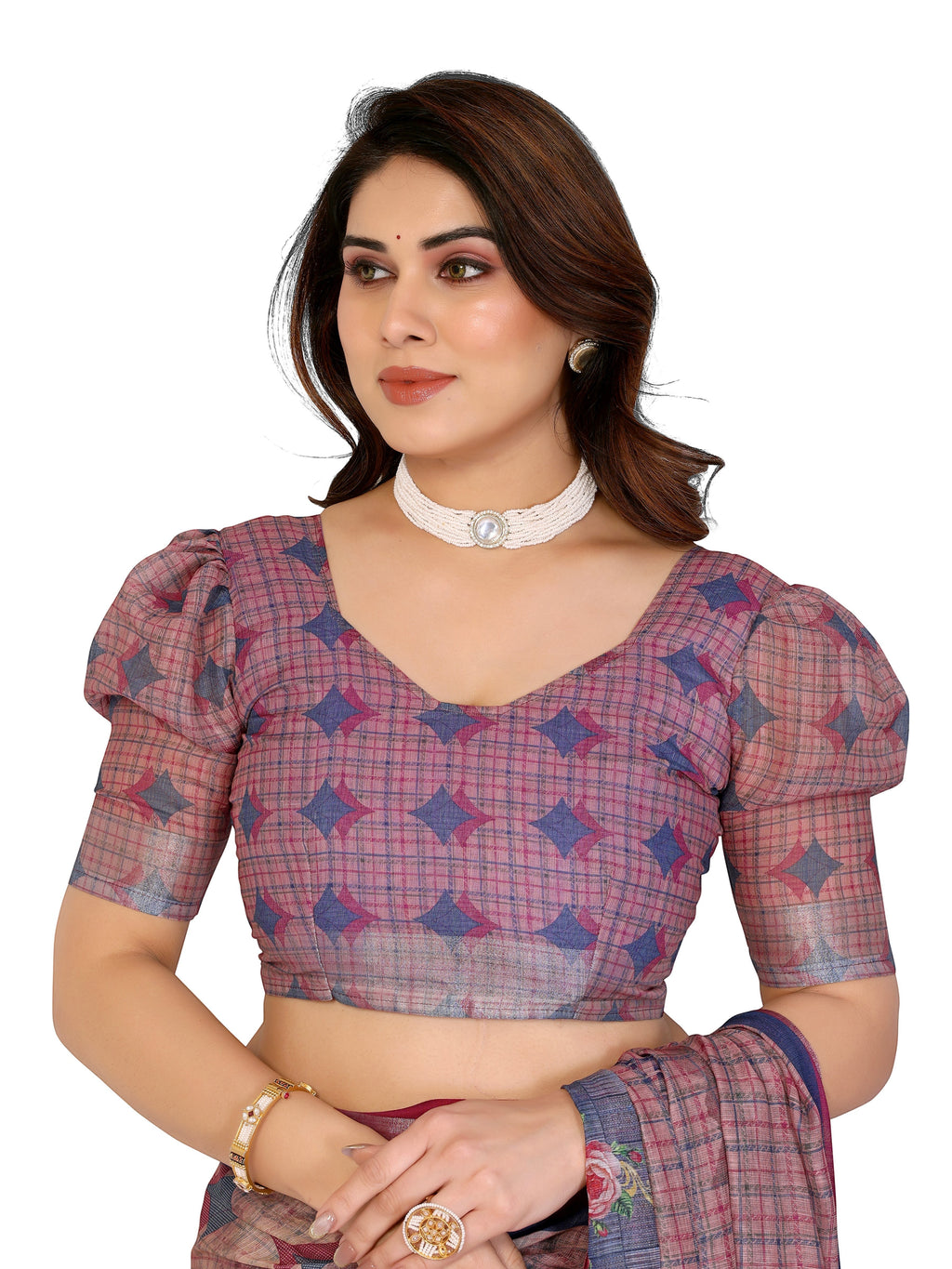 NxWear Fashion woman wearing a mauve and blue checkered saree with puff sleeves and floral print border. Embellished border detail.