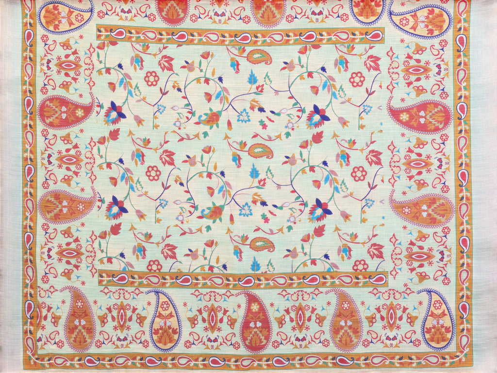 NxWear Fashion orange linen saree with intricate paisley and floral print. Features a running blouse piece.