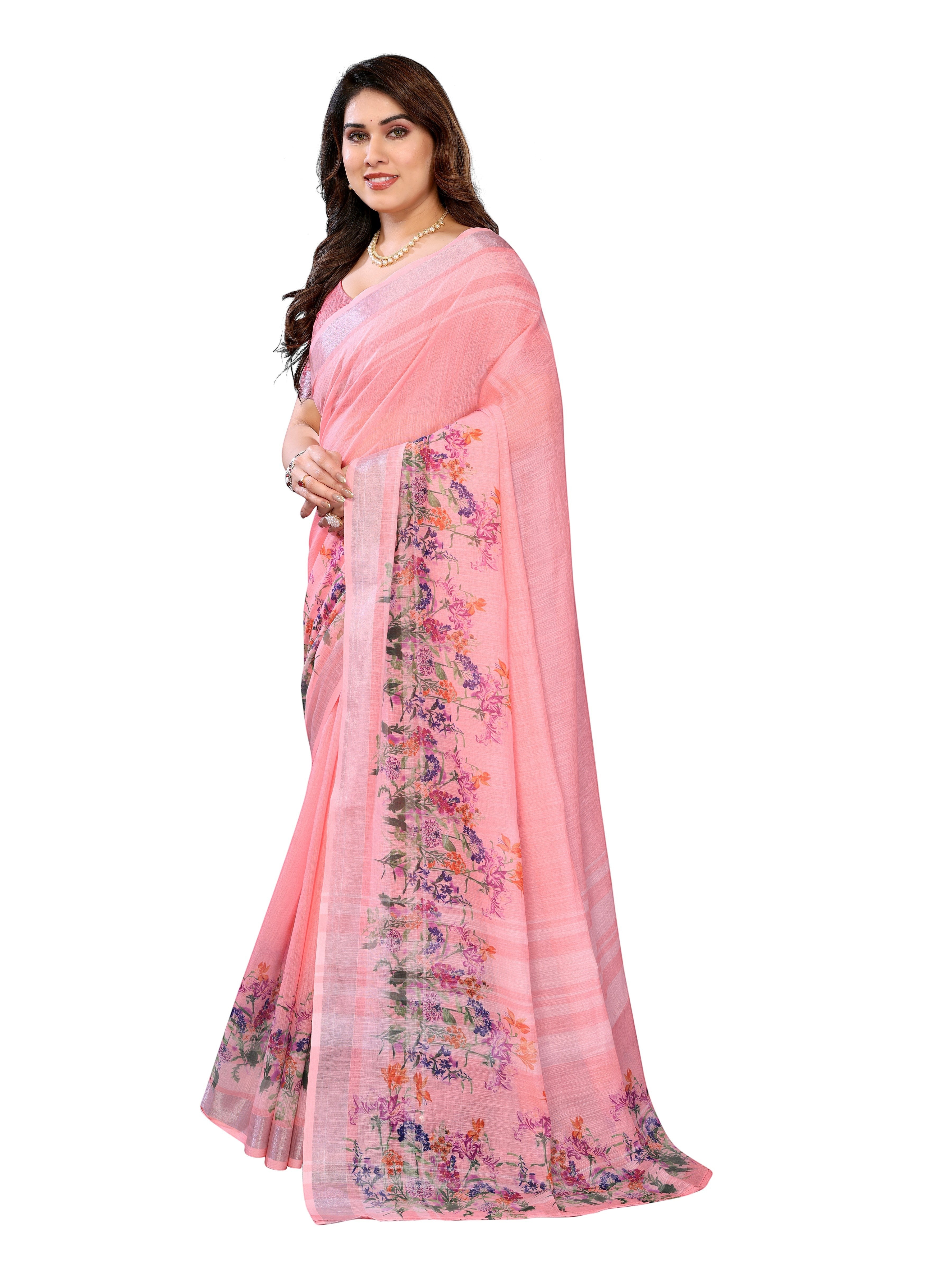 NxWear Fashion peach linen saree with floral border. Model wearing a pearl necklace.